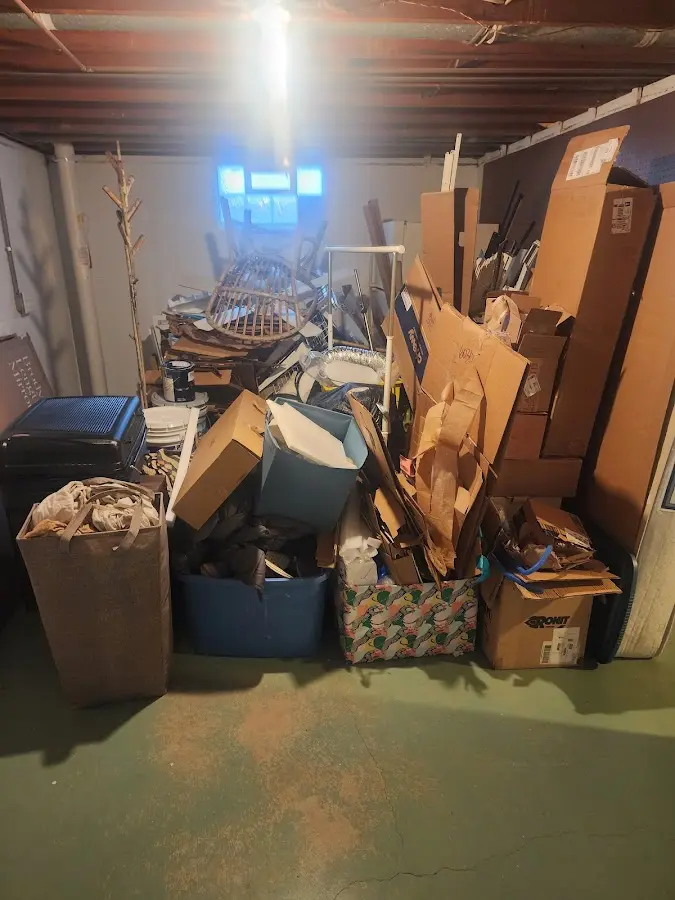 Roll-off dumpster container at job site for Yard Waste Dumpster Rental in Halls